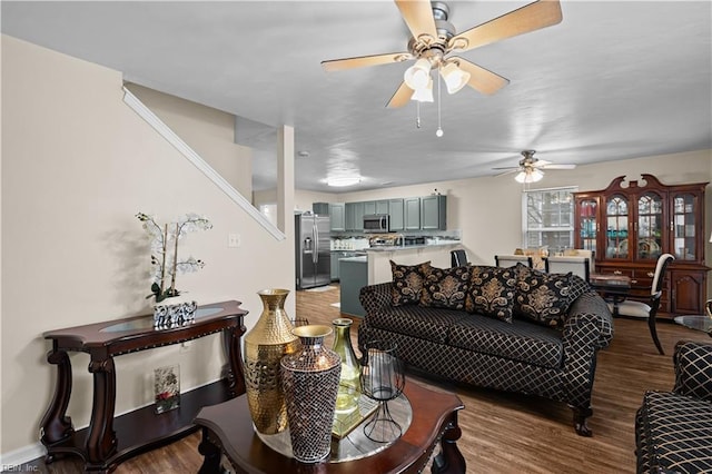 1309 W 25th St, Norfolk, VA 23508 - living area with wood finished floors, a ceiling fan, and stairs