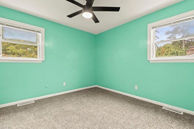 1809 Spar St, Chesapeake, VA 23321 - carpeted spare room with ceiling fan, baseboards, and plenty of natural light