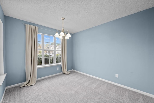 3513 Brigita Ct, Virginia Beach, VA 23453 - spare room with a chandelier, carpet floors, baseboards, and a textured ceiling