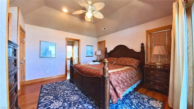 2390 Sandfiddler Rd, Corolla, NC 27927 - bedroom with wood finished floors, lofted ceiling, ceiling fan, and baseboards