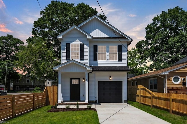 1 Lacrosse St, Hampton, VA 23663 - view of front facade featuring a garage, concrete driveway, and board and batten siding