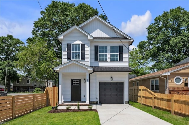 1 Lacrosse St, Hampton, VA 23663 - view of front of home with an attached garage, driveway, a shingled roof, and board and batten siding
