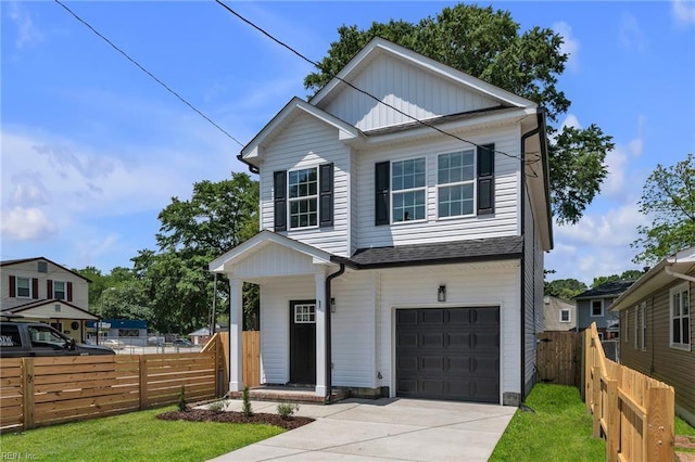 1 Lacrosse St, Hampton, VA 23663 - view of front of home with a garage, driveway, and board and batten siding