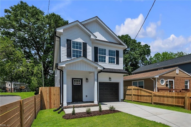 1 Lacrosse St, Hampton, VA 23663 - view of front of home with an attached garage, concrete driveway, and board and batten siding