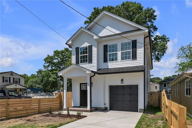 1 Lacrosse St, Hampton, VA 23663 - view of front of home with an attached garage, fence, concrete driveway, and covered porch