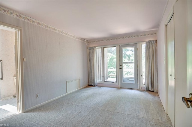 2029 Heron Ct, Suffolk, VA 23433 - unfurnished room featuring light carpet, baseboards, and wallpapered walls