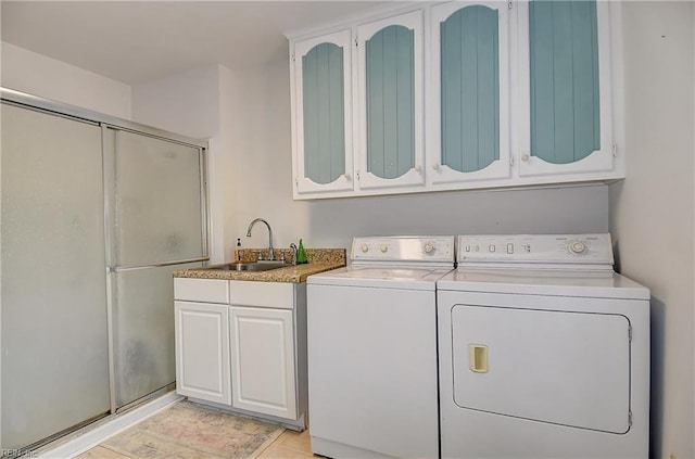 2029 Heron Ct, Suffolk, VA 23433 - clothes washing area with washer and dryer and cabinet space