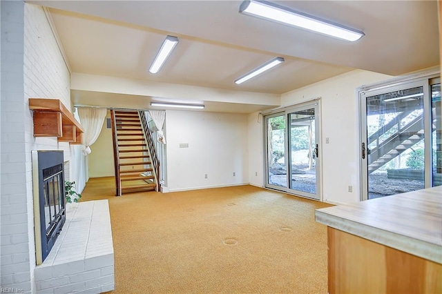 2029 Heron Ct, Suffolk, VA 23433 - basement with light carpet, stairway, a fireplace, and heating unit