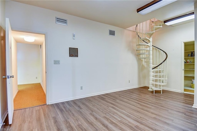 2029 Heron Ct, Suffolk, VA 23433 - empty room featuring wood finished floors, stairs, and baseboards