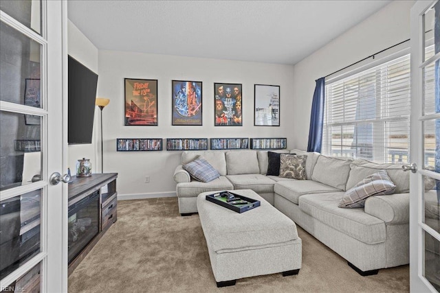 254 Mcpherson Rd, South Mills, NC 27976 - living area featuring carpet floors and baseboards