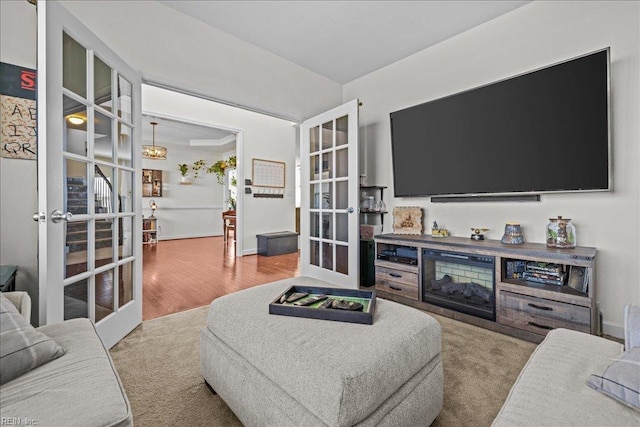 254 Mcpherson Rd, South Mills, NC 27976 - living area featuring french doors, baseboards, and wood finished floors