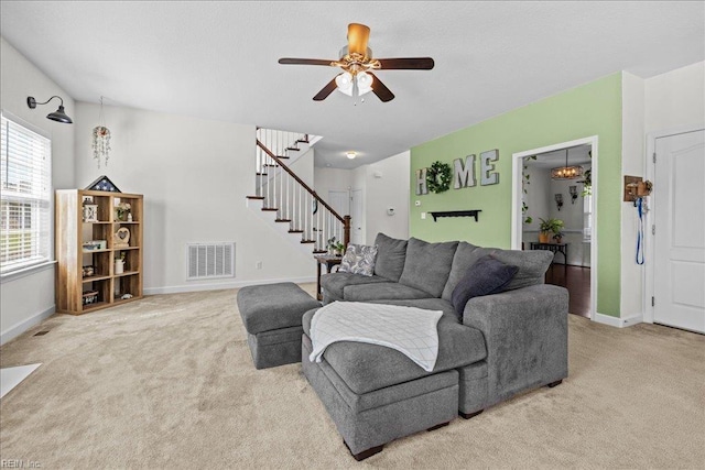 254 Mcpherson Rd, South Mills, NC 27976 - carpeted living area featuring stairs, a ceiling fan, and baseboards
