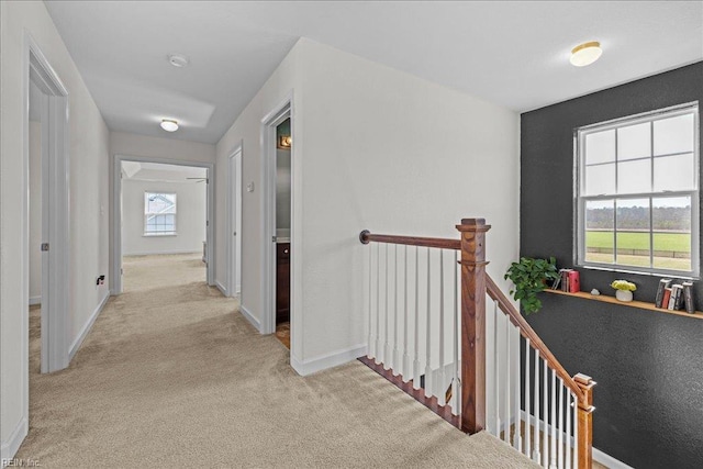 254 Mcpherson Rd, South Mills, NC 27976 - corridor featuring an upstairs landing, light carpet, and baseboards