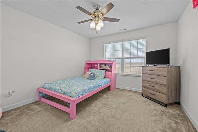 254 Mcpherson Rd, South Mills, NC 27976 - bedroom with carpet floors, baseboards, and a ceiling fan