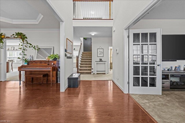 254 Mcpherson Rd, South Mills, NC 27976 - entryway with wood finished floors, crown molding, and stairway