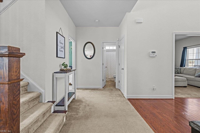 254 Mcpherson Rd, South Mills, NC 27976 - entryway with baseboards, stairs, and wood finished floors