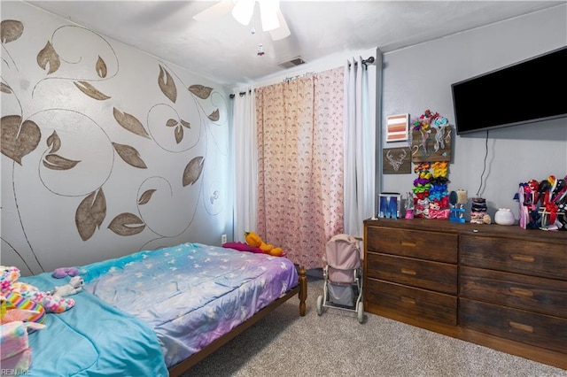 bedroom featuring carpet and a ceiling fan