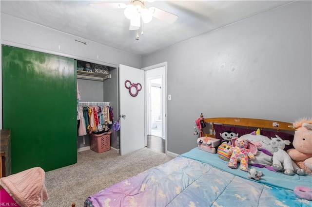 bedroom featuring a closet, carpet, and a ceiling fan
