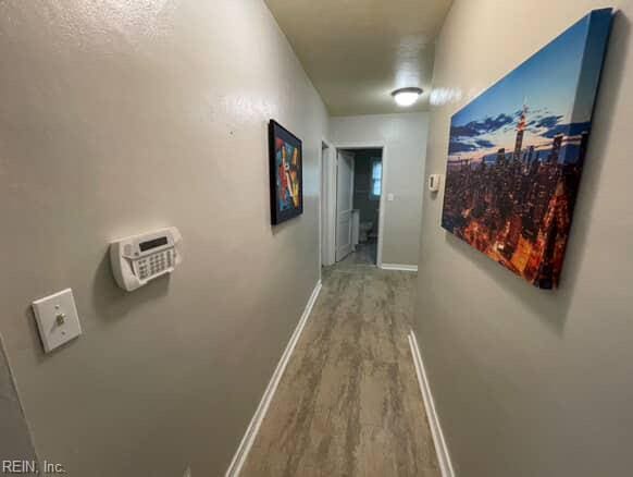 220 Chesterfield Rd, Hampton, VA 23661 - corridor featuring wood finished floors and baseboards