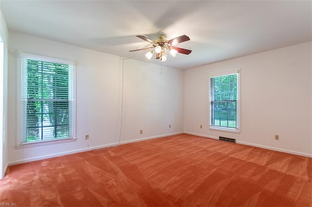 205 Shackleford Rd, Yorktown, VA 23693 - unfurnished room featuring a ceiling fan, plenty of natural light, light carpet, and baseboards