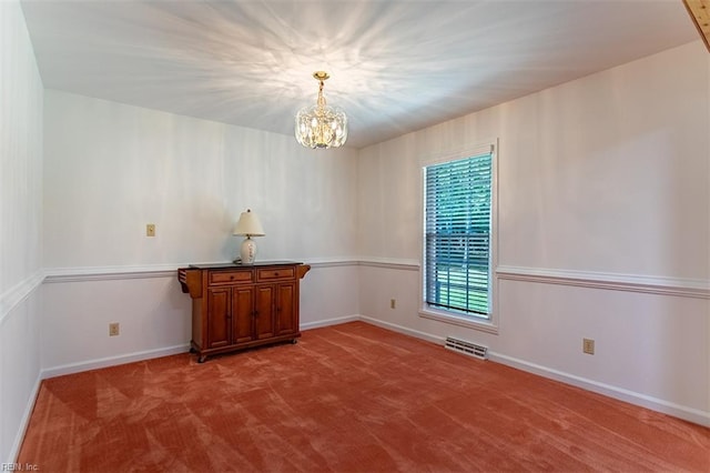 205 Shackleford Rd, Yorktown, VA 23693 - spare room with a chandelier, carpet flooring, and baseboards