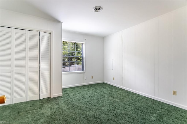 205 Shackleford Rd, Yorktown, VA 23693 - unfurnished bedroom with carpet, baseboards, and a closet