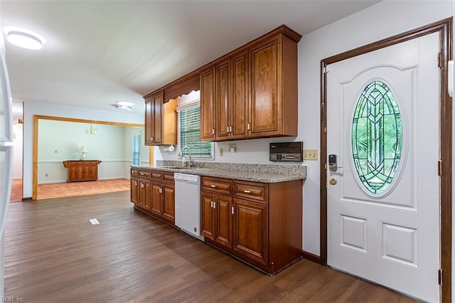 205 Shackleford Rd, Yorktown, VA 23693 - kitchen with dishwasher, dark wood-style floors, a sink, and brown cabinets