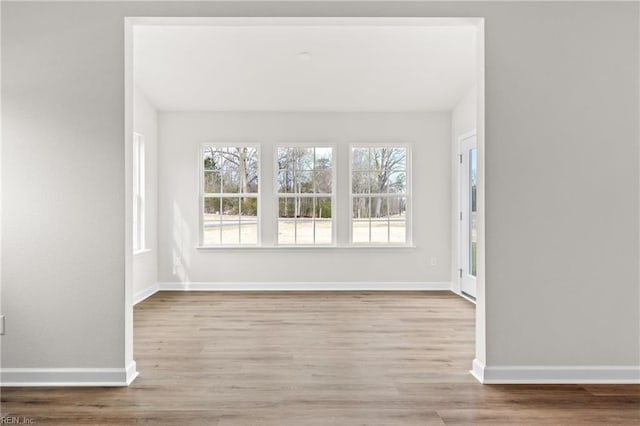 4409 Abercorn Dr, Suffolk, VA 23435 - spare room featuring wood finished floors and baseboards