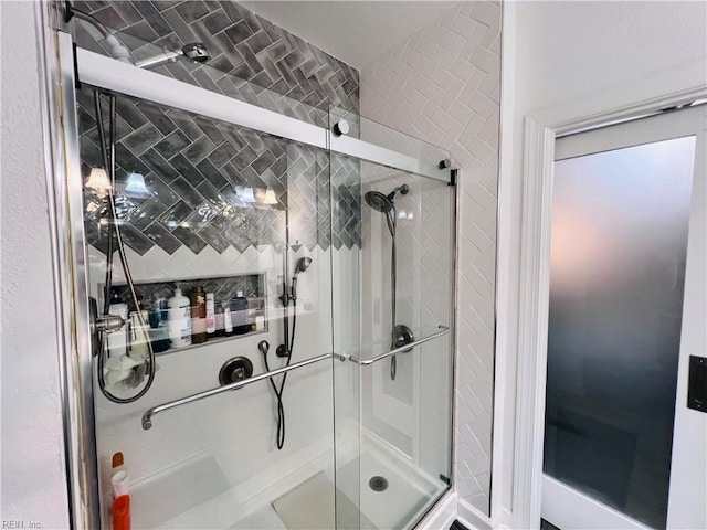 full bathroom with a stall shower