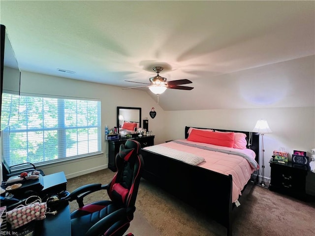 bedroom with carpet flooring, lofted ceiling, ceiling fan, and baseboards