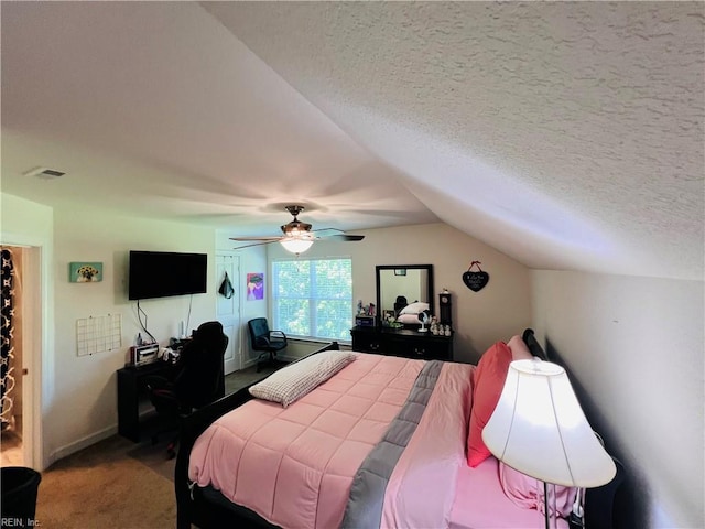 carpeted bedroom featuring ceiling fan, lofted ceiling, and baseboards