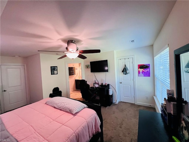 bedroom with carpet flooring, ceiling fan, and baseboards