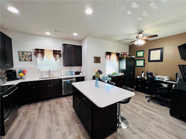 kitchen with dishwasher, electric stove, healthy amount of natural light, an office area, and recessed lighting
