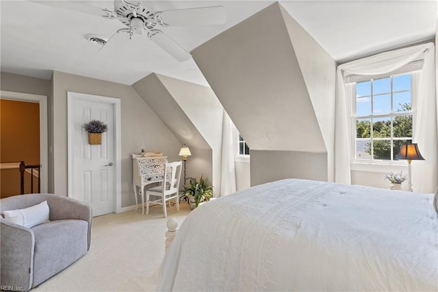 carpeted bedroom featuring baseboards and ceiling fan