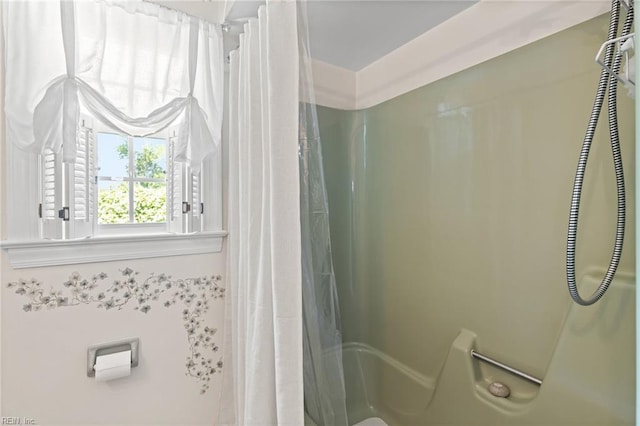 full bathroom with a shower with shower curtain