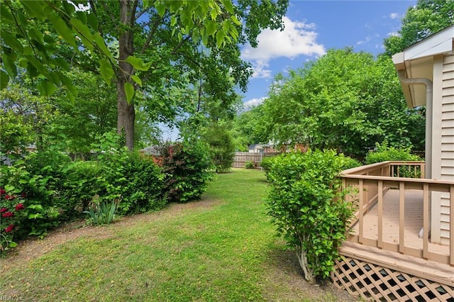 view of yard with a wooden deck