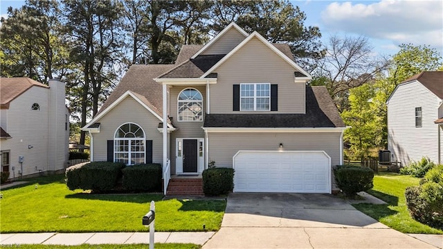 6738 Burbage Landing Cir, Suffolk, VA 23435 - traditional home with a front yard, driveway, a garage, roof with shingles, and central AC unit