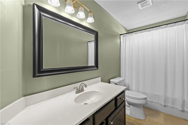 6738 Burbage Landing Cir, Suffolk, VA 23435 - bathroom with toilet, vanity, tile patterned flooring, and a textured ceiling