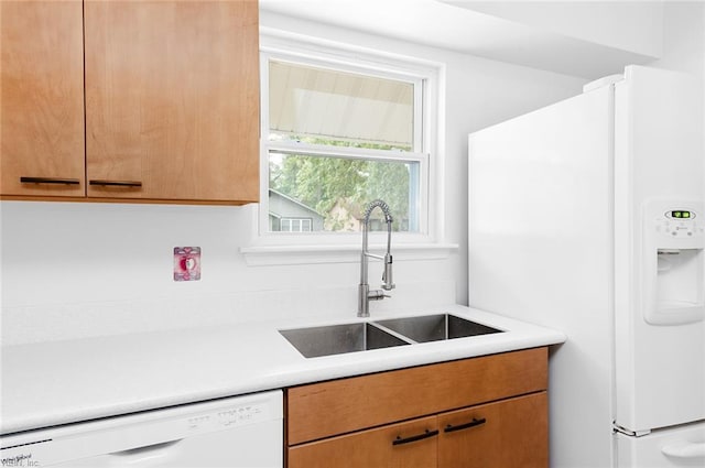 13024 Green Grove Ln, Newport News, VA 23608 - kitchen featuring white appliances, a sink, light countertops, and brown cabinetry