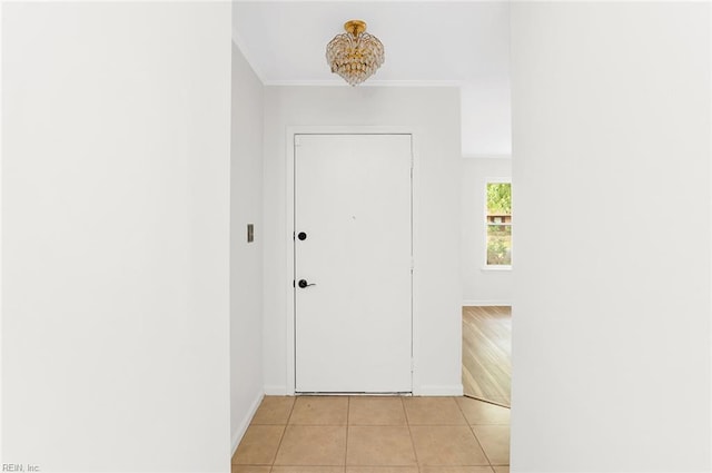 13024 Green Grove Ln, Newport News, VA 23608 - doorway to outside with light tile patterned floors, crown molding, and baseboards