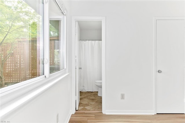 13024 Green Grove Ln, Newport News, VA 23608 - corridor with light wood-style flooring and baseboards