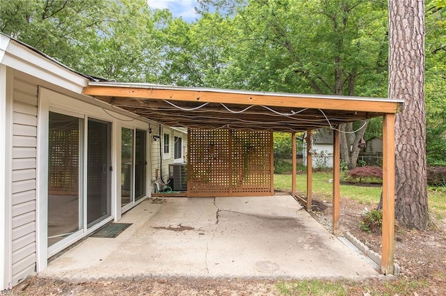 13024 Green Grove Ln, Newport News, VA 23608 - view of patio featuring a carport and central AC