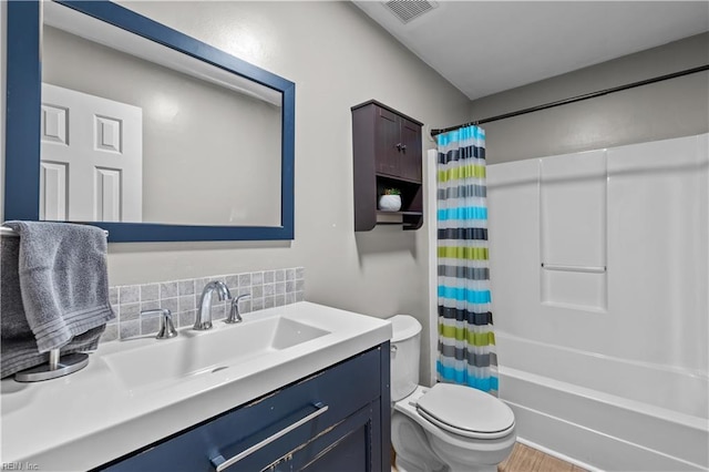 3412 Winterhawk Ct, Chesapeake, VA 23323 - full bathroom with toilet, backsplash, vanity, and shower / bath combo with shower curtain
