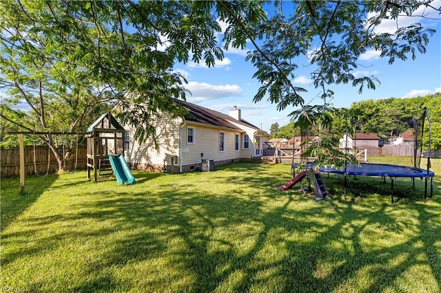3412 Winterhawk Ct, Chesapeake, VA 23323 - view of yard with a trampoline and a playground