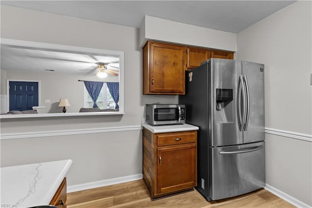 3412 Winterhawk Ct, Chesapeake, VA 23323 - kitchen featuring appliances with stainless steel finishes, light wood-style flooring, light countertops, and baseboards