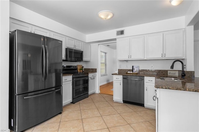 3669 Purebred Dr, Virginia Beach, VA 23453 - kitchen featuring freestanding refrigerator, double oven range, dishwashing machine, black microwave, and a sink