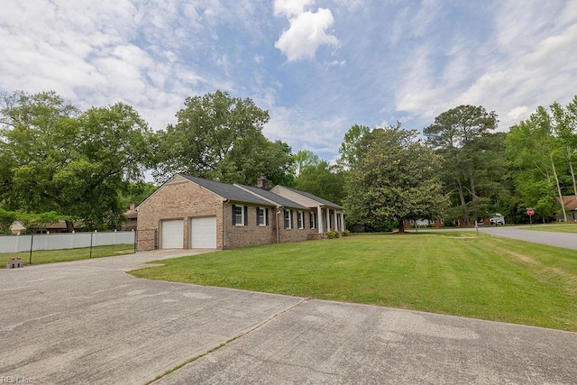 100 Woodland Cir, Franklin, VA 23851 - single story home with brick siding, driveway, a chimney, and a garage