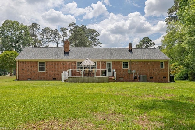 rear view of house with crawl space, a chimney, a deck, and central air condition unit