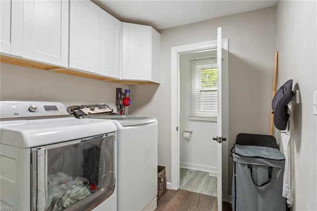 628 Briarwood Dr, Chesapeake, VA 23322 - laundry room featuring cabinet space, washer and clothes dryer, wood finished floors, and baseboards