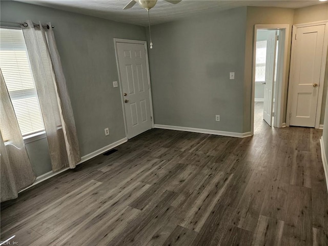 107 Cherry Acres Dr, Hampton, VA 23669 - empty room with ceiling fan, healthy amount of natural light, dark wood-style flooring, and baseboards